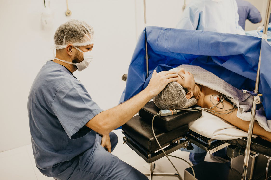 A woman in surgery in hospital