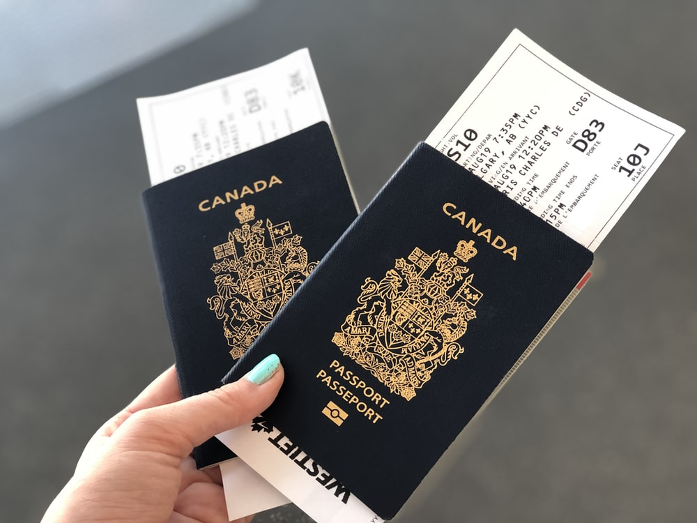 Nanda & Associate Lawyers Canada - A couple with Canadian passports