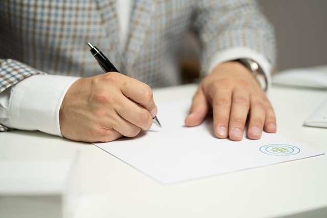A lawyer drafting real estate paperwork