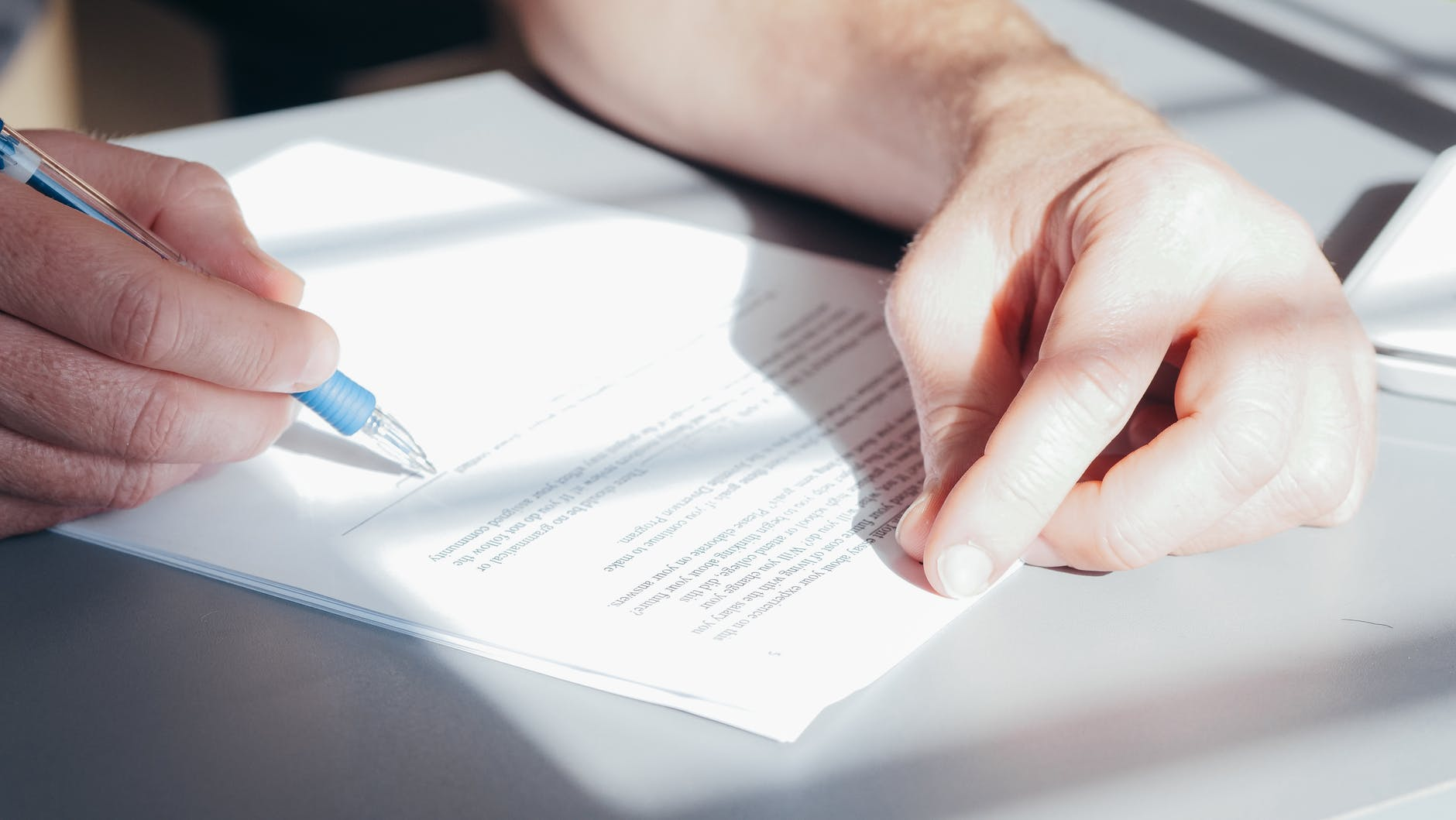 A person filling the application form