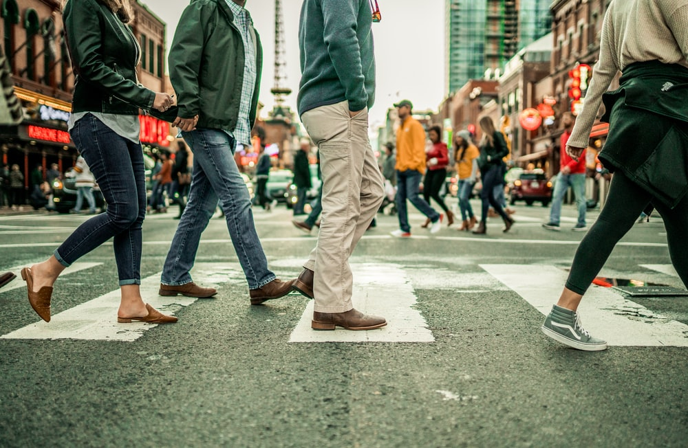 People crossing a street. 