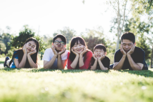A couple enjoying family time with their family