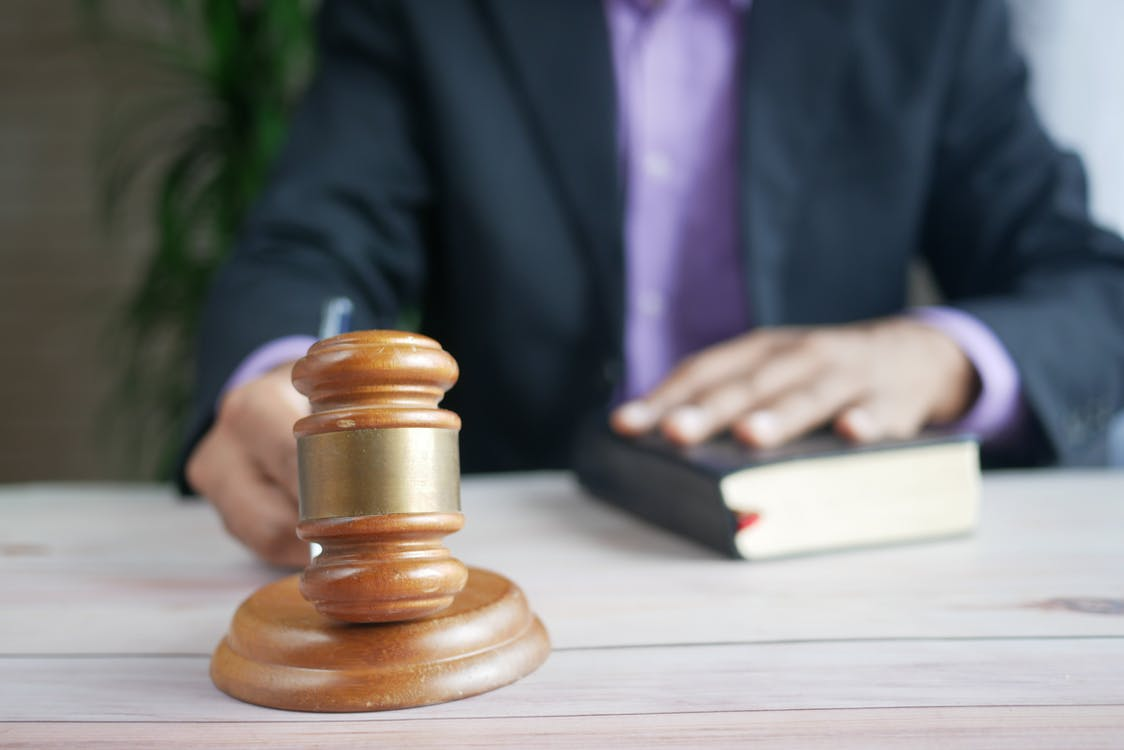 A person striking the gavel
