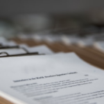 Nanda & Associate Lawyers Canada - A document on the table