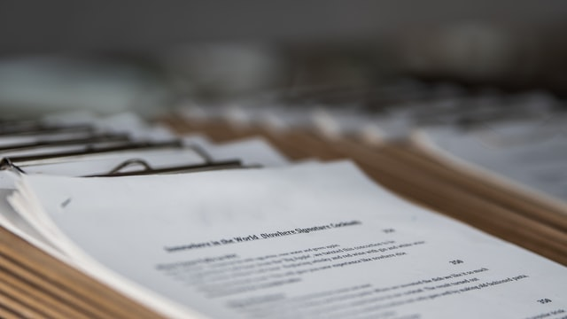 Nanda & Associate Lawyers Canada - A document on the table