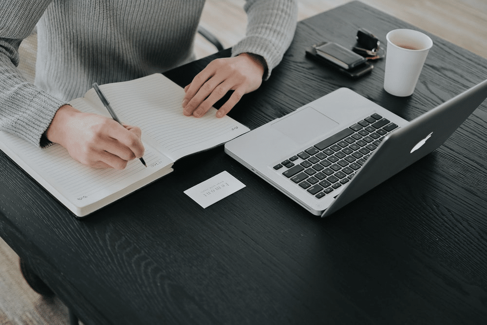 an immigration lawyer helping their client online