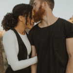 Nanda & Associate Lawyers Canada - A man kissing a woman’s forehead