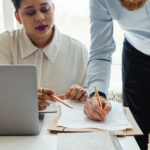 Nanda & Associate Lawyers Canada - A couple signing a prenuptial agreement