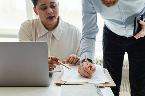 Nanda & Associate Lawyers Canada - A couple signing a prenuptial agreement