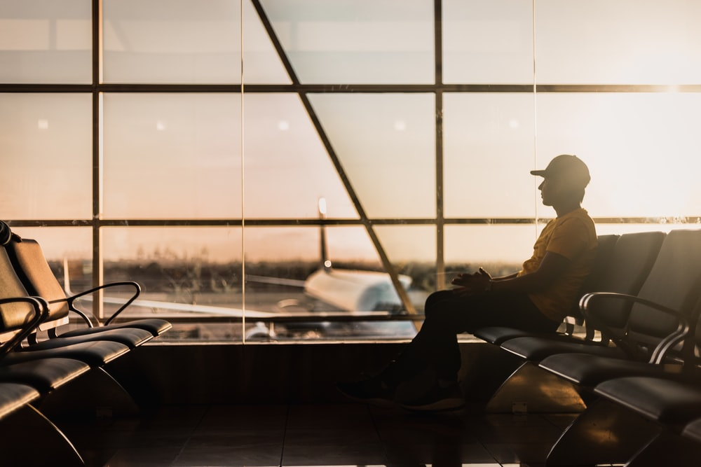 Nanda & Associate Lawyers Canada - A person waiting at an airport.