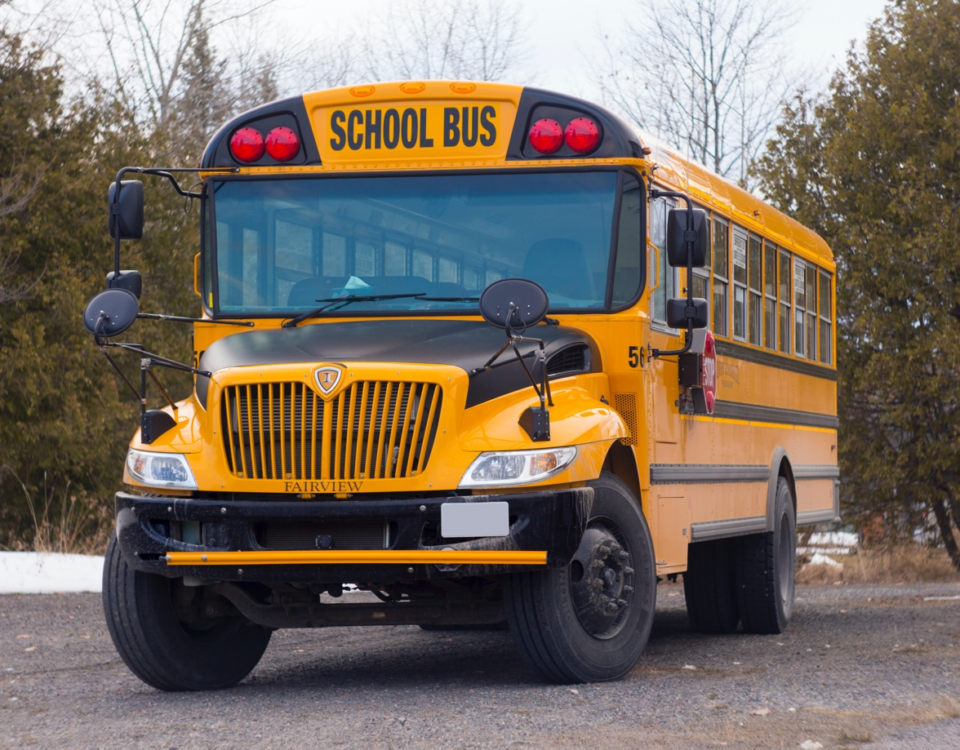 Nanda & Associate Lawyers Canada - A photograph of a school bus