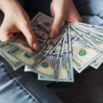 Nanda & Associate Lawyers Canada - A person counting cash