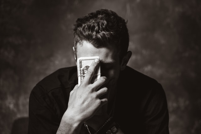 A person holding money in his hands