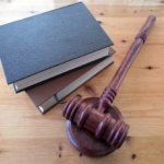 Nanda & Associate Lawyers Canada - Law books and hammer