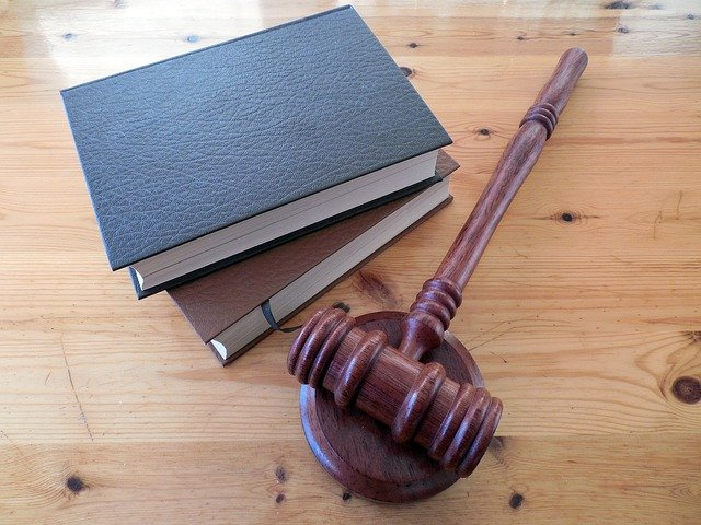 Nanda & Associate Lawyers Canada - Law books and hammer
