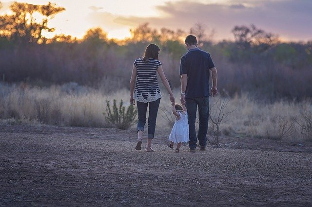 Nanda & Associate Lawyers Canada - Parents with their daughter