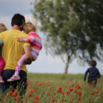 Nanda & Associate Lawyers Canada - Children playing in the field
