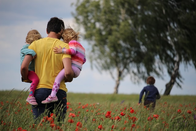Nanda & Associate Lawyers Canada - Children playing in the field