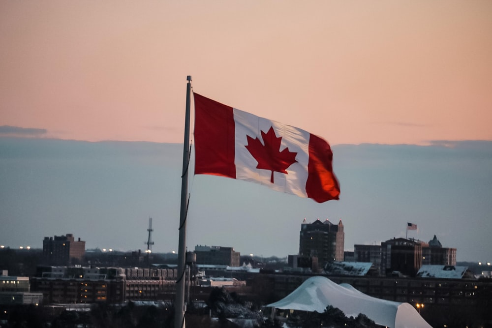 Nanda & Associate Lawyers Canada - a waving Canadian flag