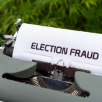 Nanda & Associate Lawyers Canada - Election fraud written on a paper