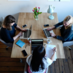 Nanda & Associate Lawyers Canada - Three people in a meeting