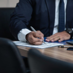 Nanda & Associate Lawyers Canada - A lawyer writing on a paper