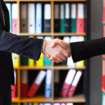 Nanda & Associate Lawyers Canada - two people shaking hands