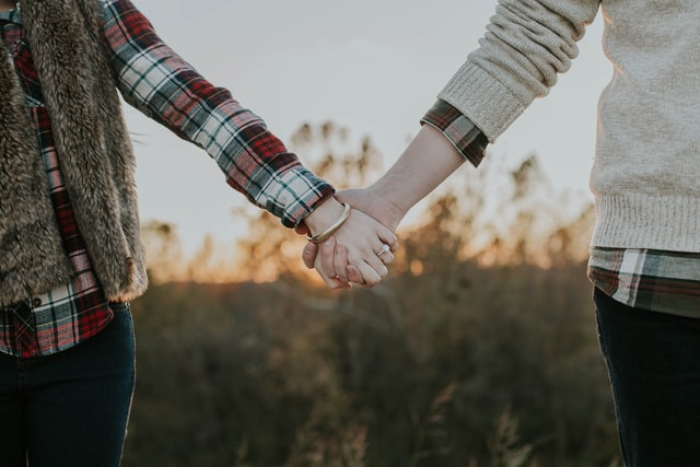 Nanda & Associate Lawyers Canada -Newlyweds holding hands