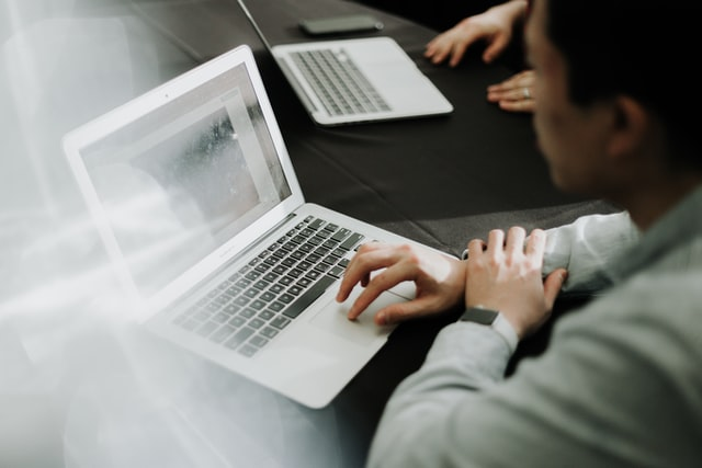 An individual completing a work permit application