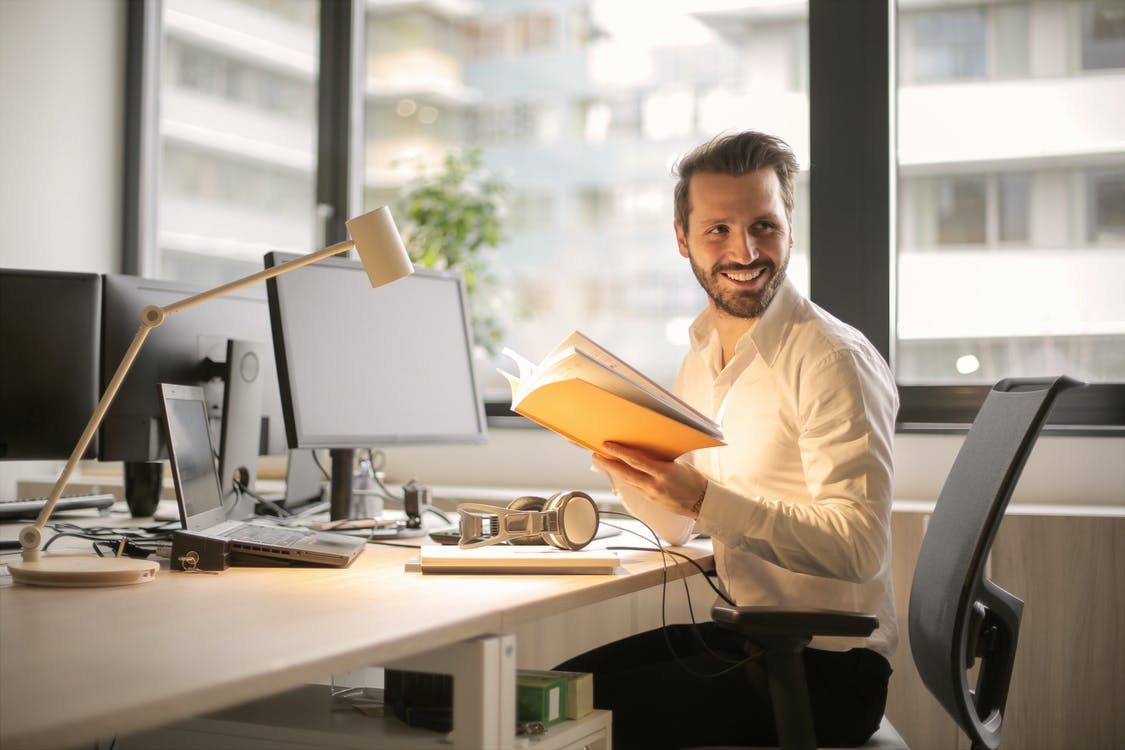Nanda & Associate Lawyers Canada - A businessman working in their office