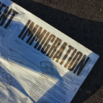 Nanda & Associate Lawyers Canada - Immigration document on the road