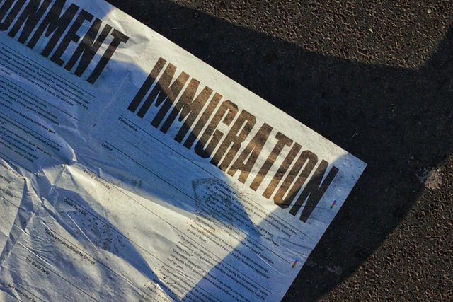 Nanda & Associate Lawyers Canada - Immigration document on the road