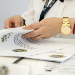 Nanda & Associate Lawyers Canada - An immigration lawyer evaluating documents for an appeal