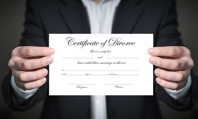 Nanda & Associate Lawyers Canada - A lawyer holding a divorce certificate