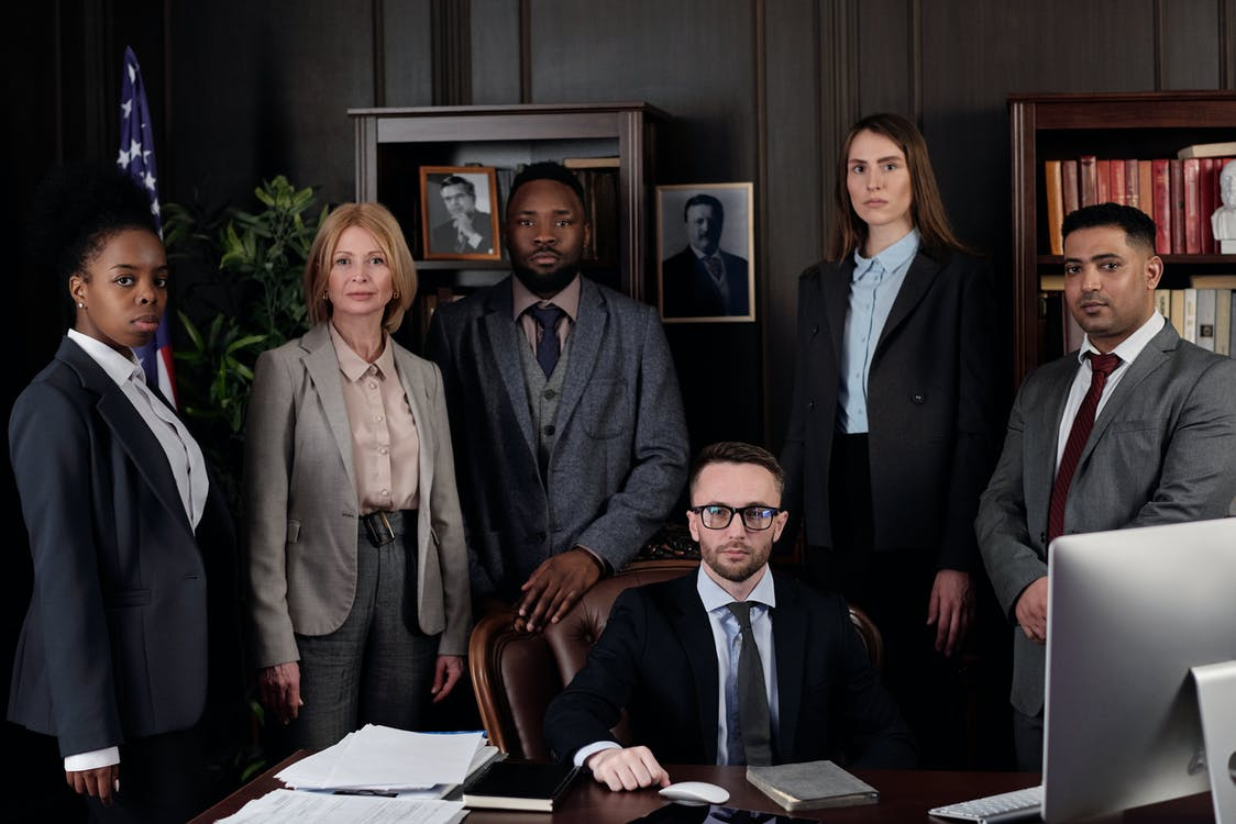 Nanda & Associate Lawyers Canada - A team of adoption lawyers in an office