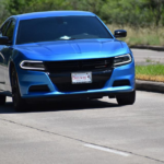 Nanda & Associate Lawyers Canada - Electric Blue car on the road