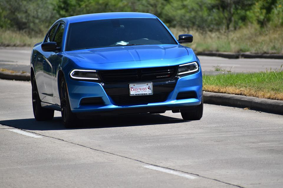 Nanda & Associate Lawyers Canada - Electric Blue car on the road