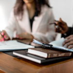 Nanda & Associate Lawyers Canada - people going through legal documents