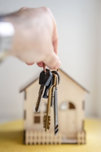 A buyer holding the keys of a new house