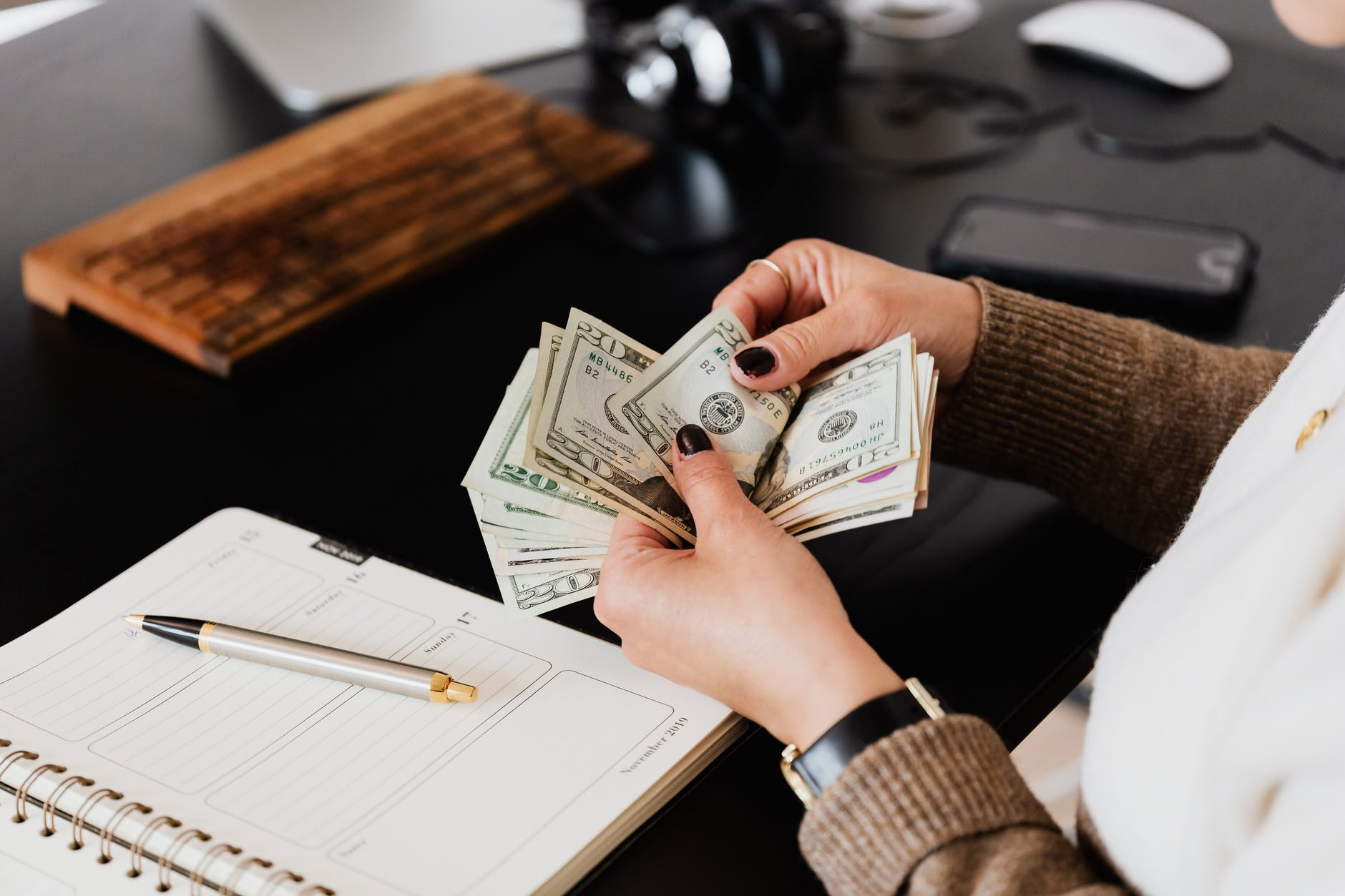 Nanda & Associate Lawyers Canada - counting cash