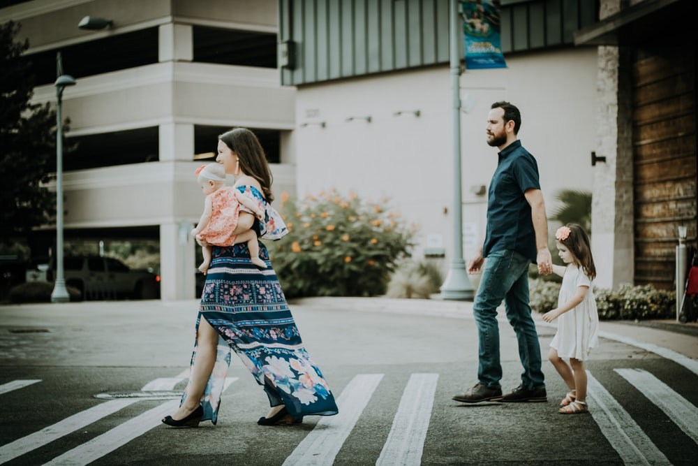 Nanda & Associate Lawyers Canada - Parents walking with their children