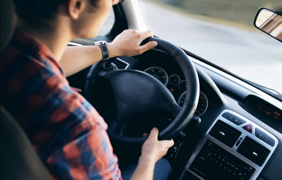 Nanda & Associate Lawyers Canada - man driving a car