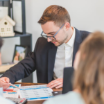 Nanda & Associate Lawyers Canada - A real estate agent sealing the deal