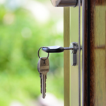 Nanda & Associate Lawyers Canada - A key inserted in a door.