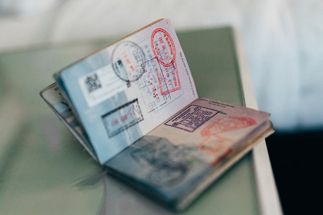 Nanda & Associate Lawyers Canada - A passport with visa stamps