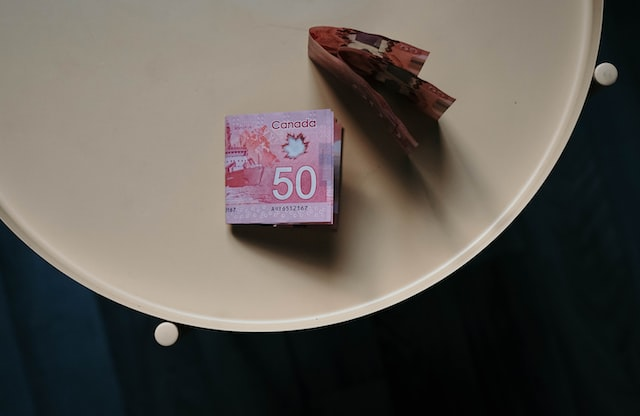 Nanda & Associate Lawyers Canada - Closeup of fifty Canadian dollar bills