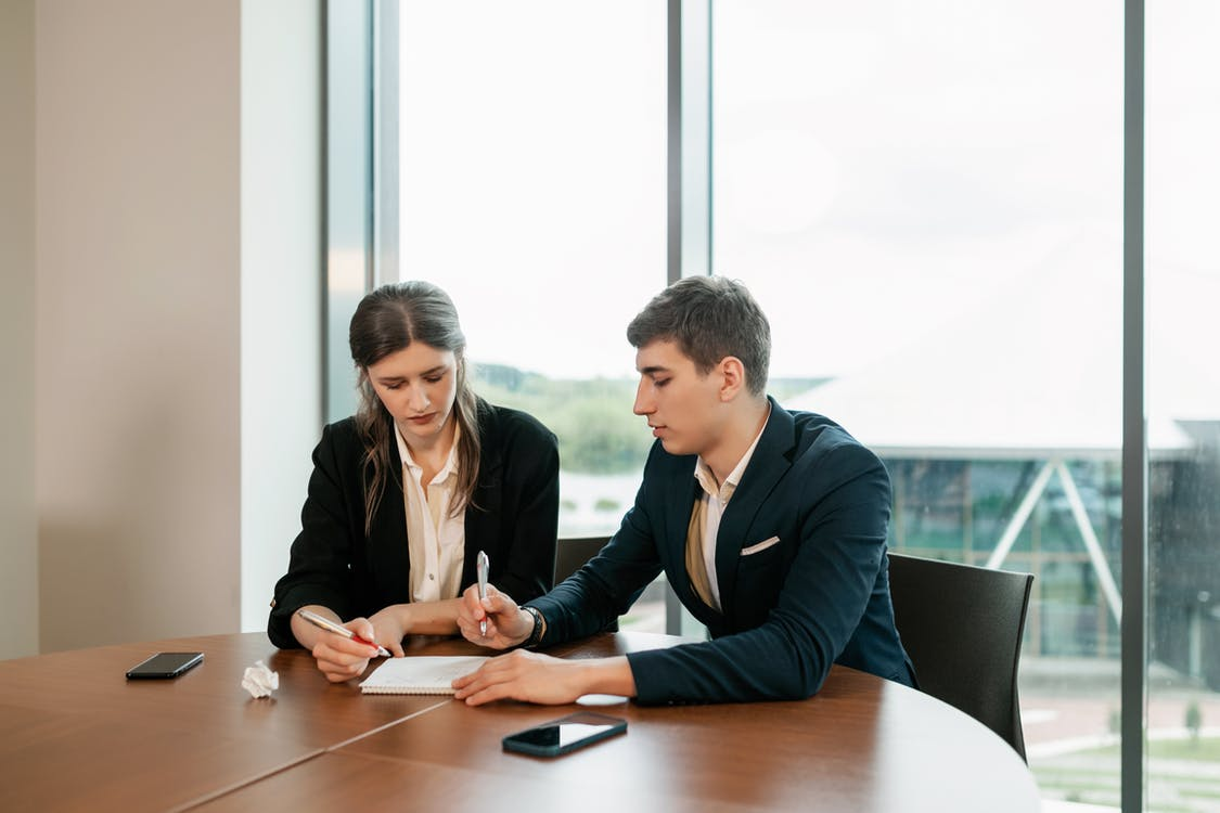 A couple of signing documents
