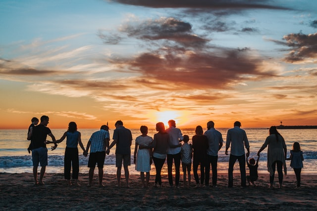 Nanda & Associate Lawyers Canada - A family watching the sunset at a beach