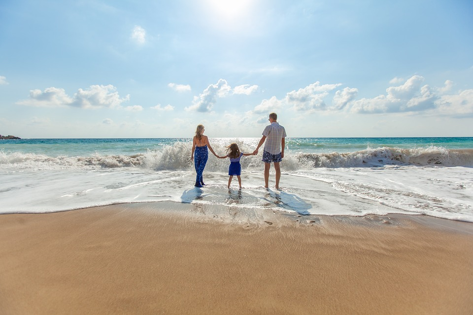 Family enjoying at beach.
