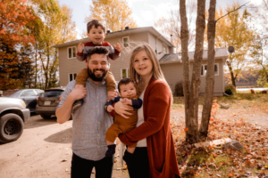 A family posing for the picture 